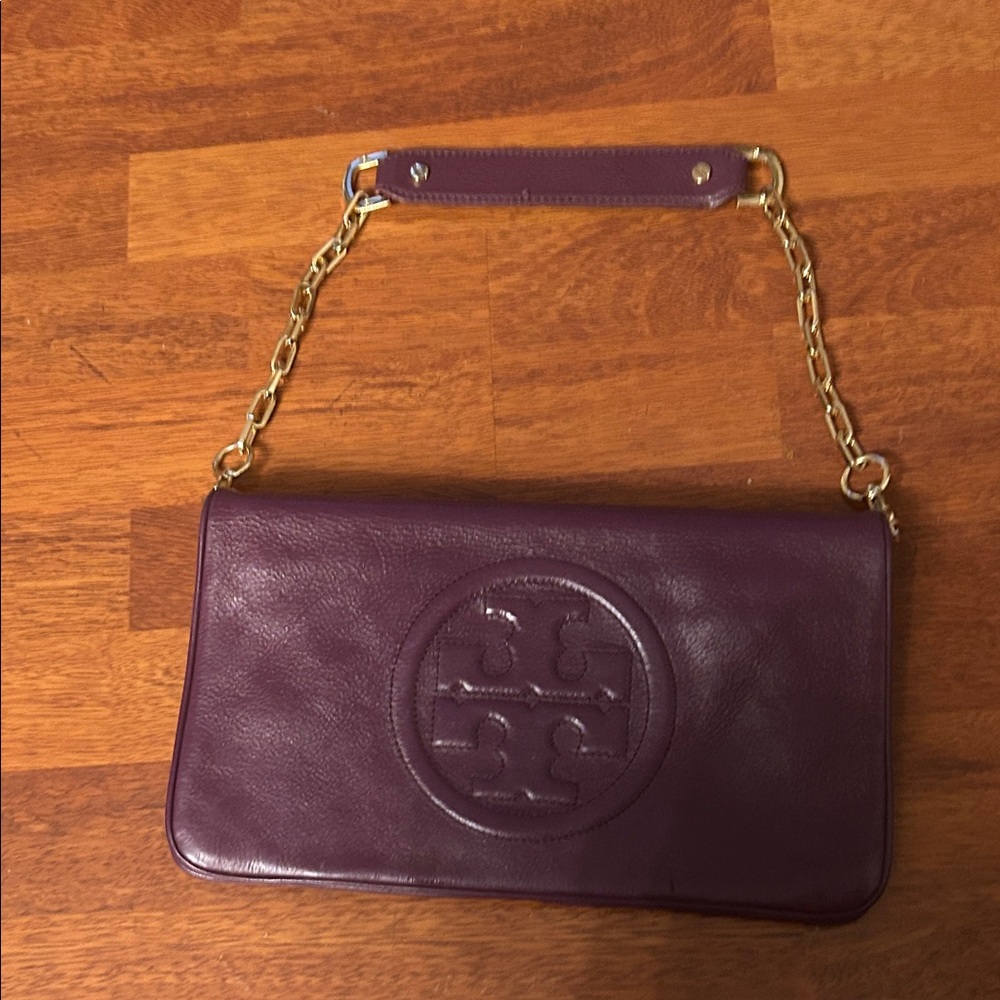 Tory Burch Plum/egg plant Leather Clutch with Gold Accents. - Picture 11 of 16